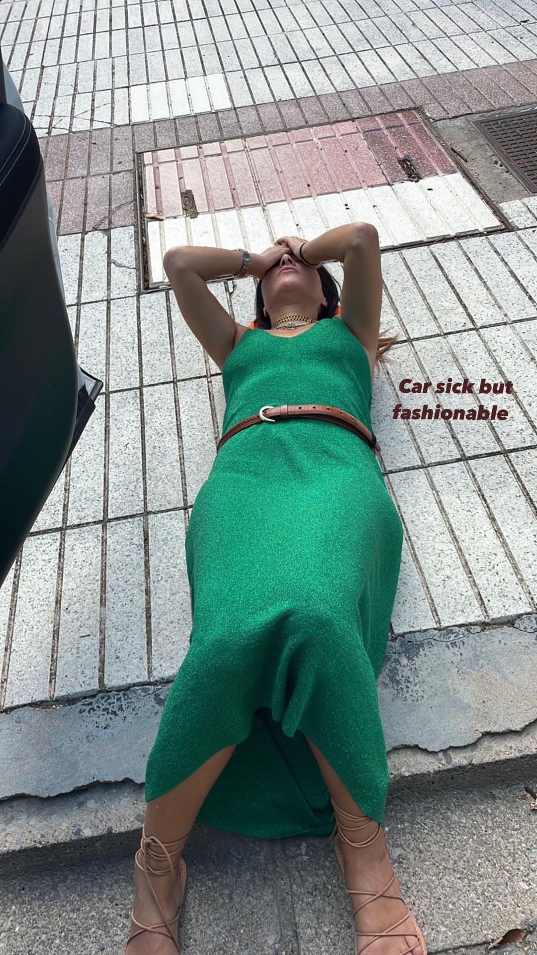"Car sick but fashionable" on a Barcelona sidewalk