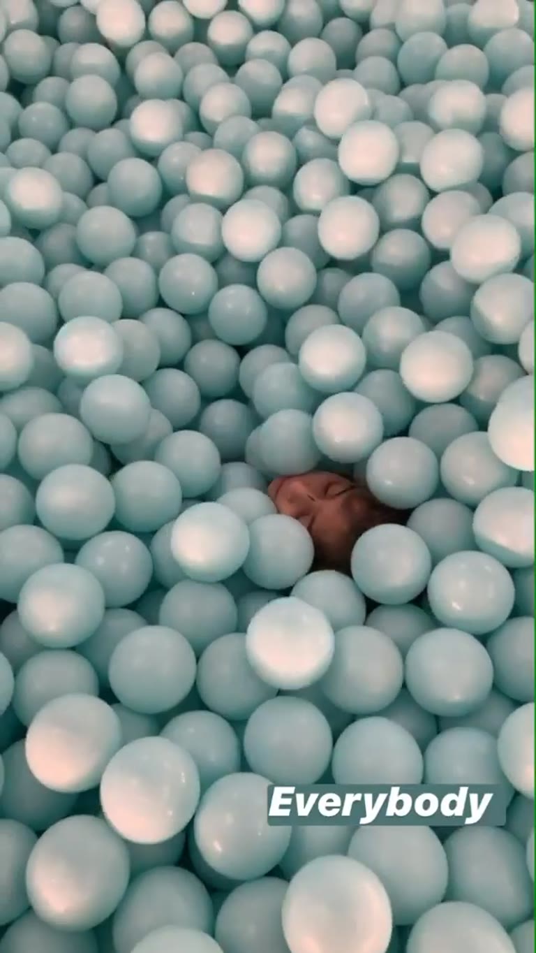 Buried in a giant ball pit in NYC