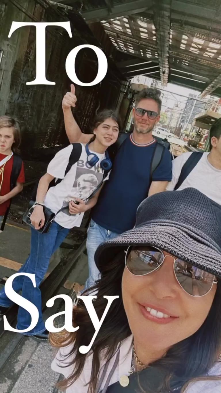 Family selfie under the tracks in Osaka