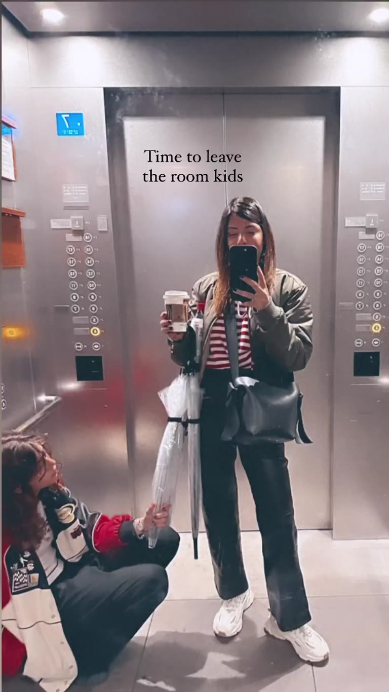 Hotel elevator mirror selfie in Tokyo