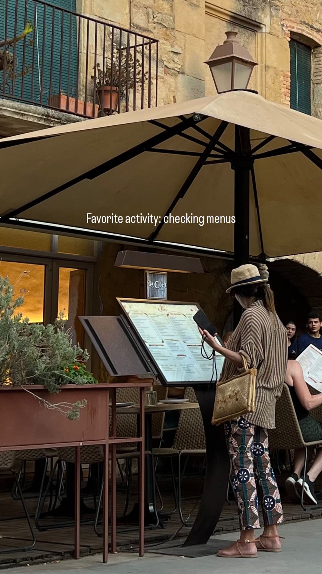 Checking menus at La Cort, Peratallada