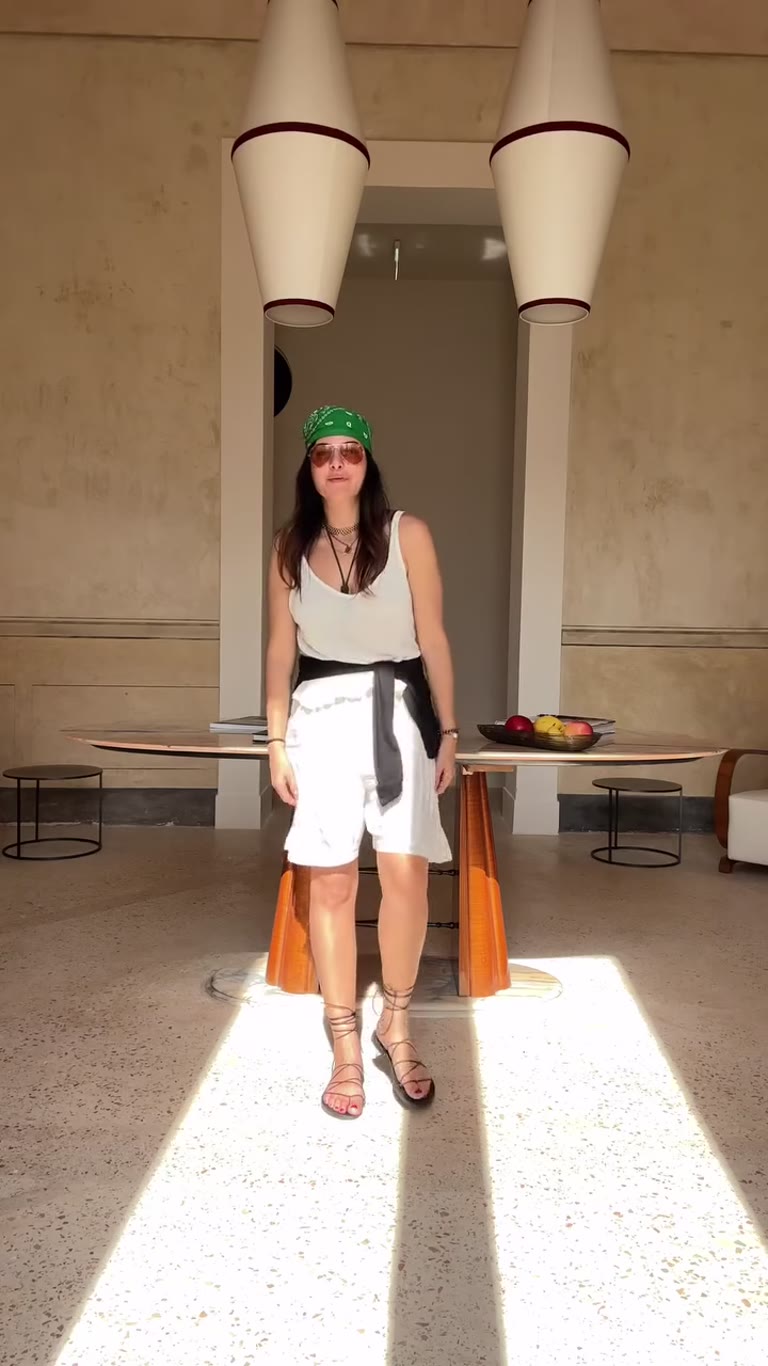 Outfit twirl in a Puglia hotel lobby