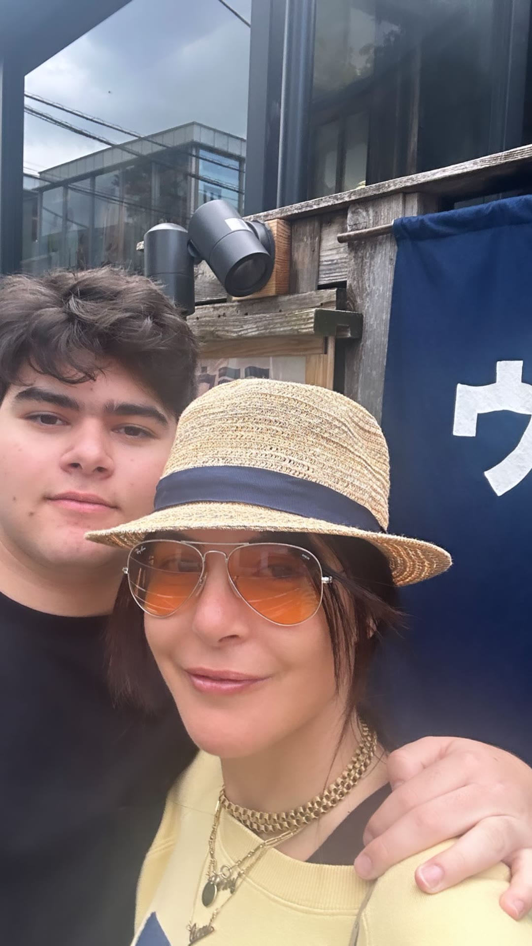 Selfie outside a Tokyo spot with noren curtain