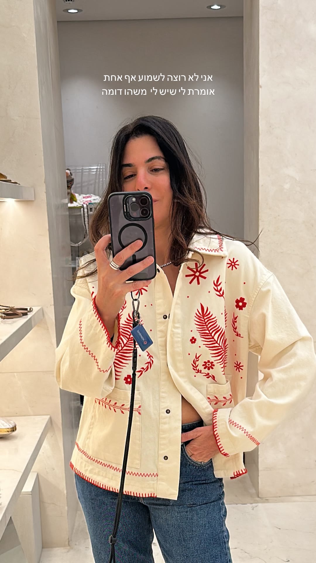 Red-embroidered jacket fitting-room find in Paris