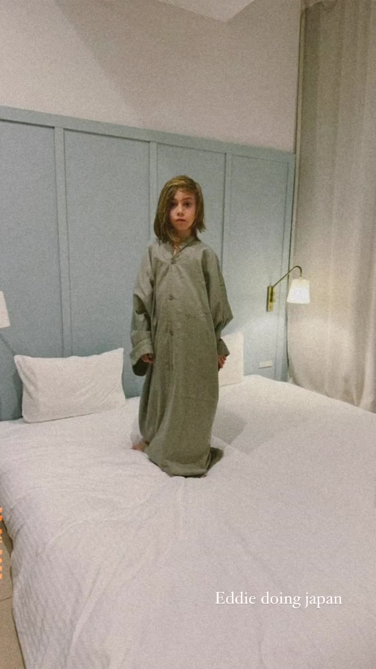 Kid in a yukata in a Kyoto hotel room