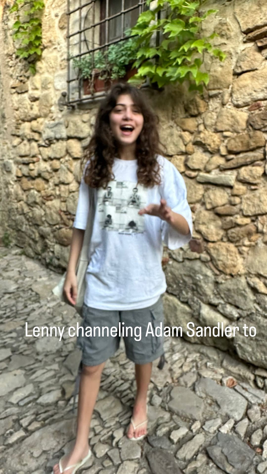 Goofing around in a stone village alley