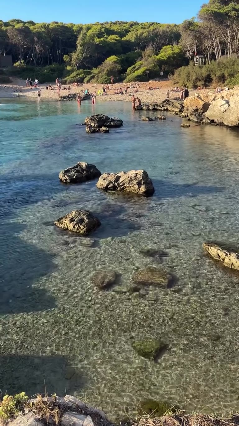 Rocky cove at sunset in Puglia