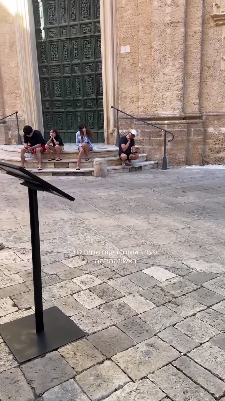 Waiting on church steps in Puglia