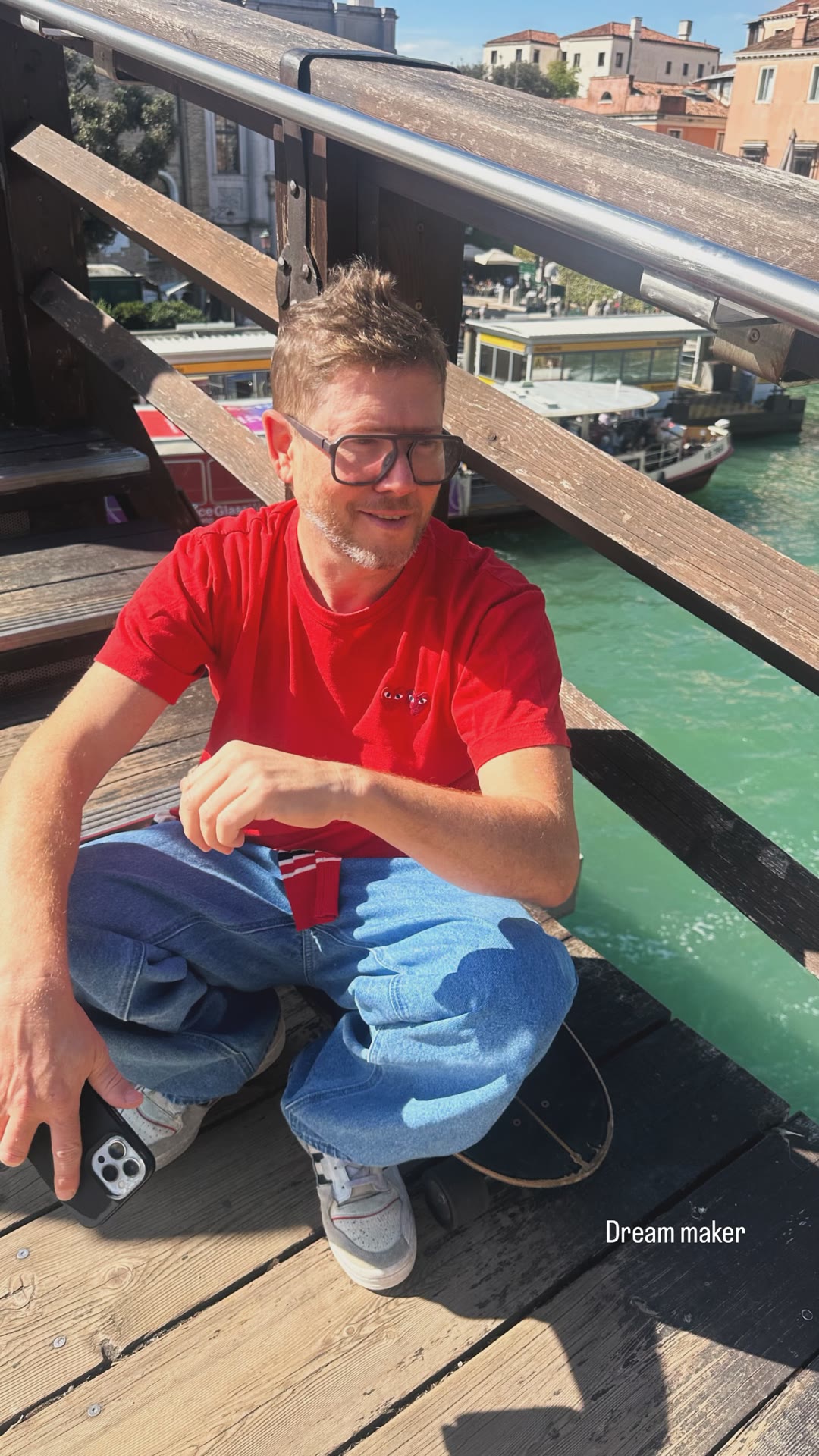 Sitting on Ponte degli Scalzi, Venice