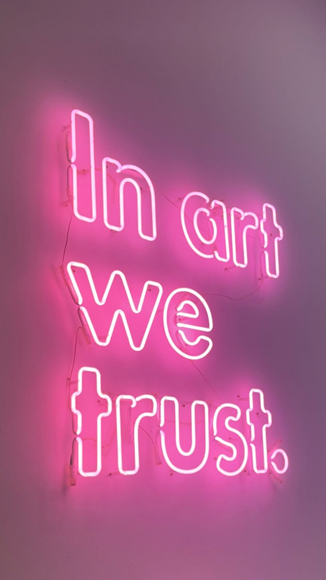 "In art we trust" neon in Barcelona