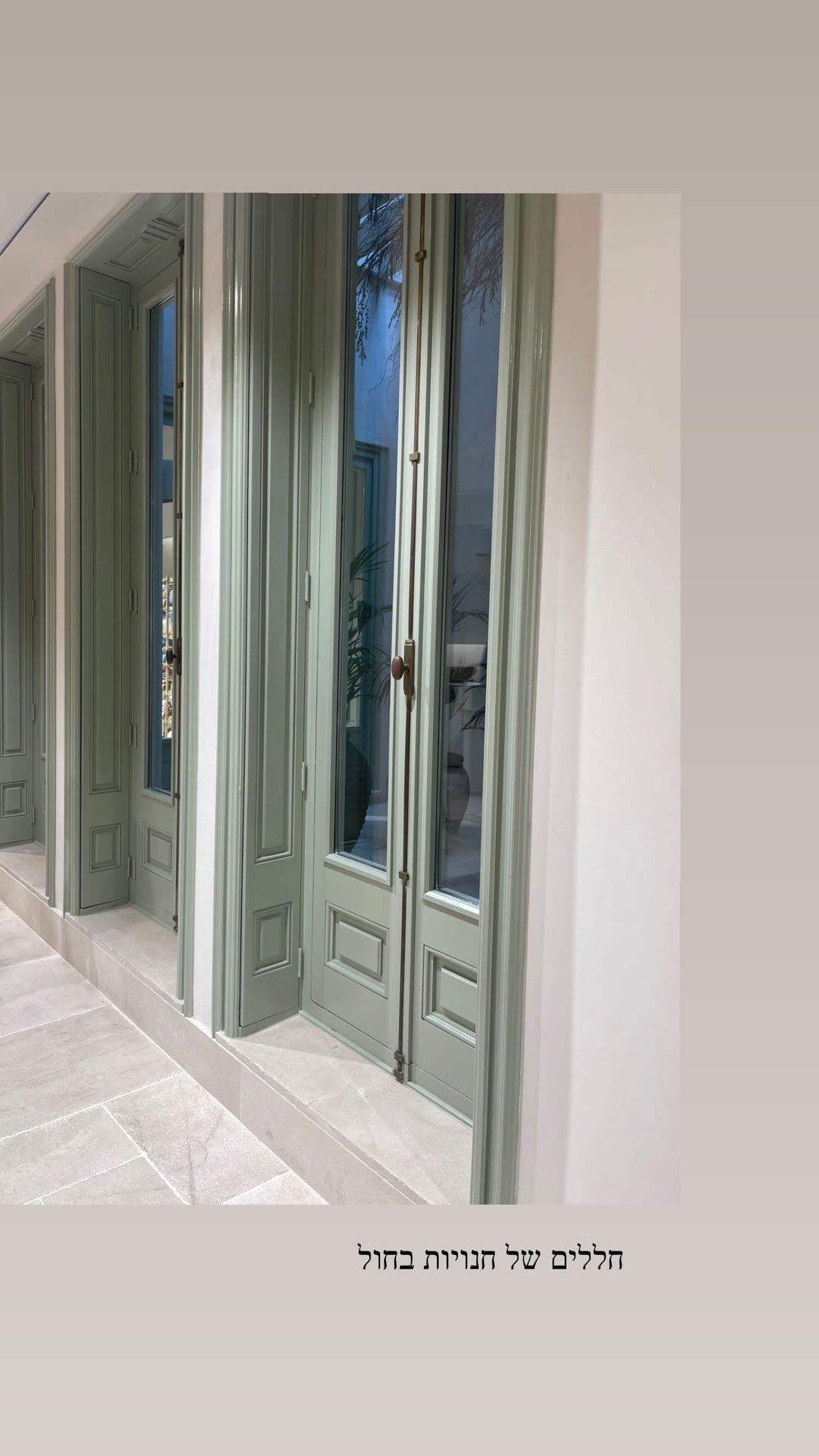 Mint green shopfront doors in Barcelona