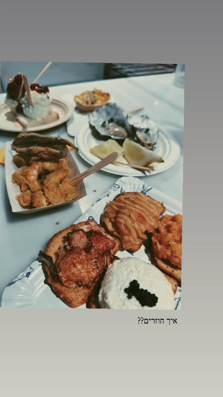 Seafood feast — oysters, lobster roll, caviar