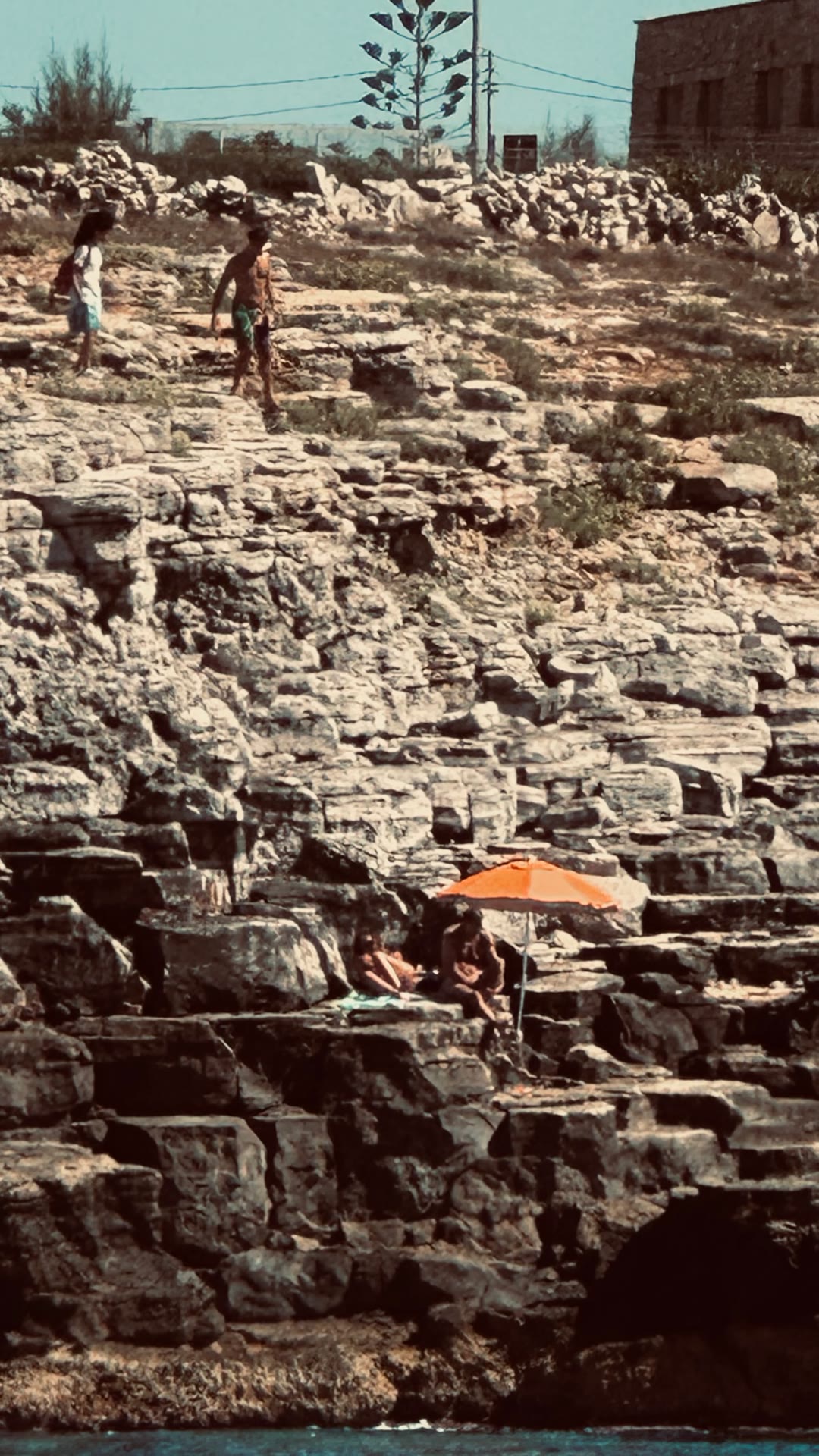Rocky sunbathing coves in Puglia