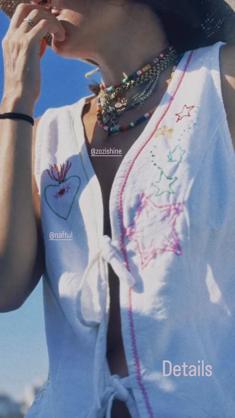 Embroidered beach top details — @naftul & @zozishine