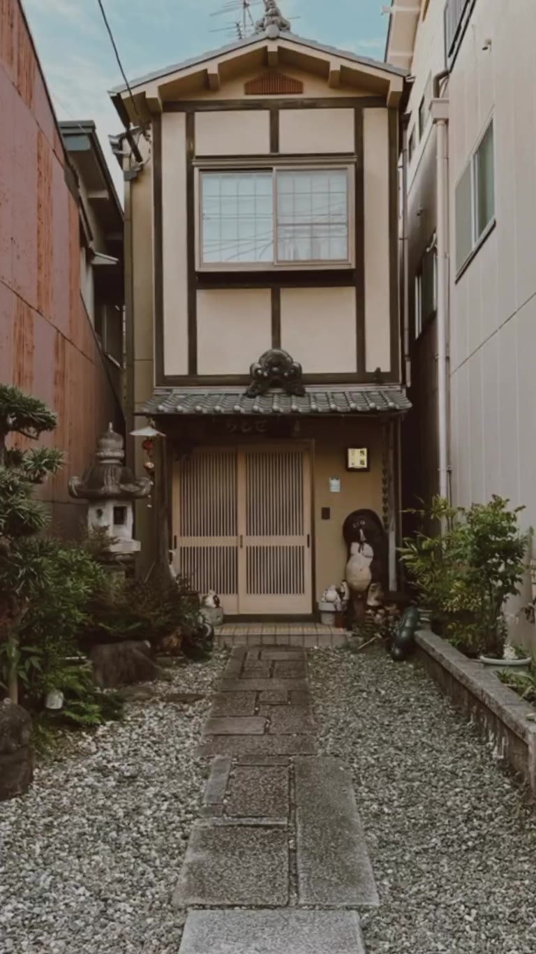 Hidden machiya entrance in a Kyoto alley