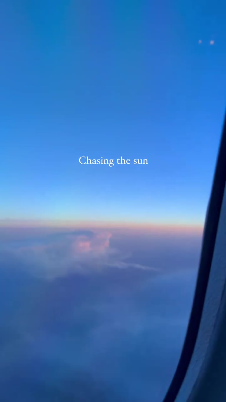 "Chasing the sun" — plane window en route to Tokyo