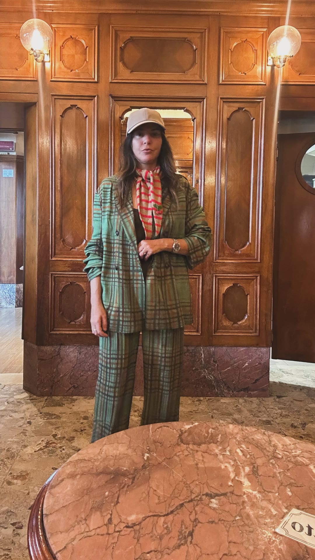 Green plaid suit in a Venice hotel lobby