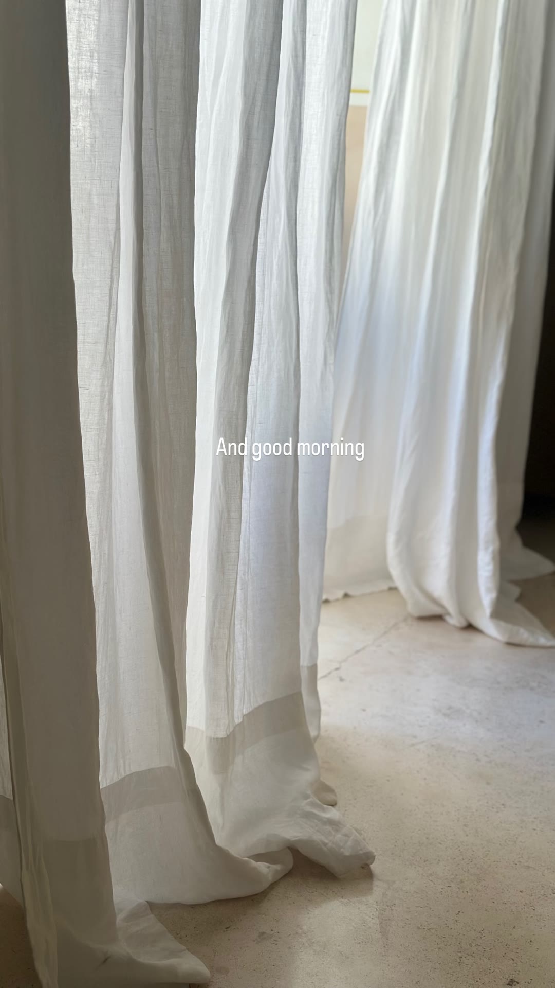 Morning light through linen curtains in Puglia