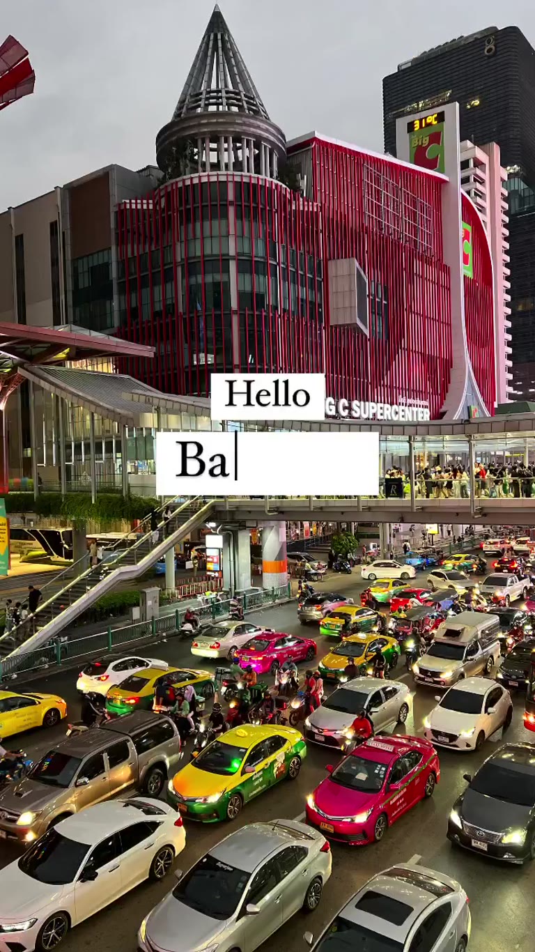Hello Bangkok — Ratchaprasong traffic at dusk