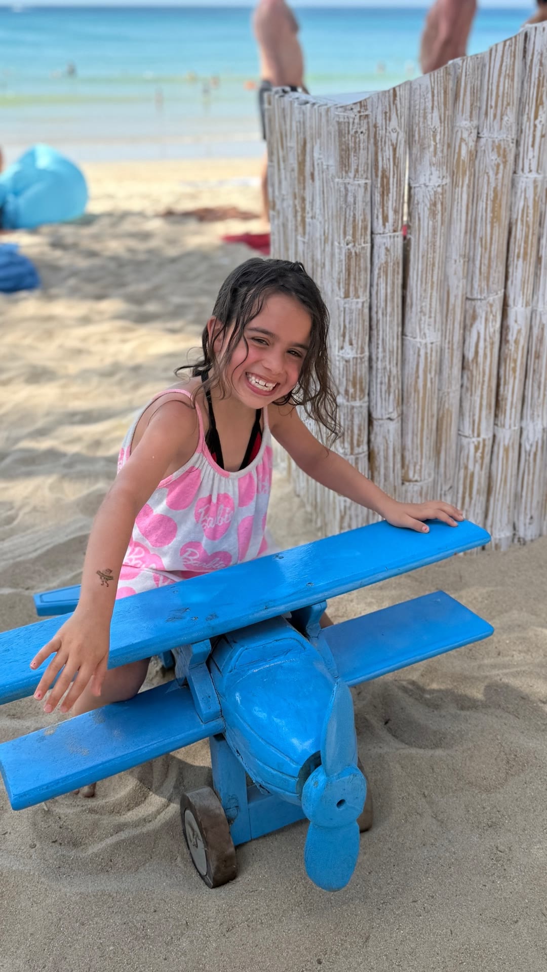 Beach day in Phuket with a wooden plane