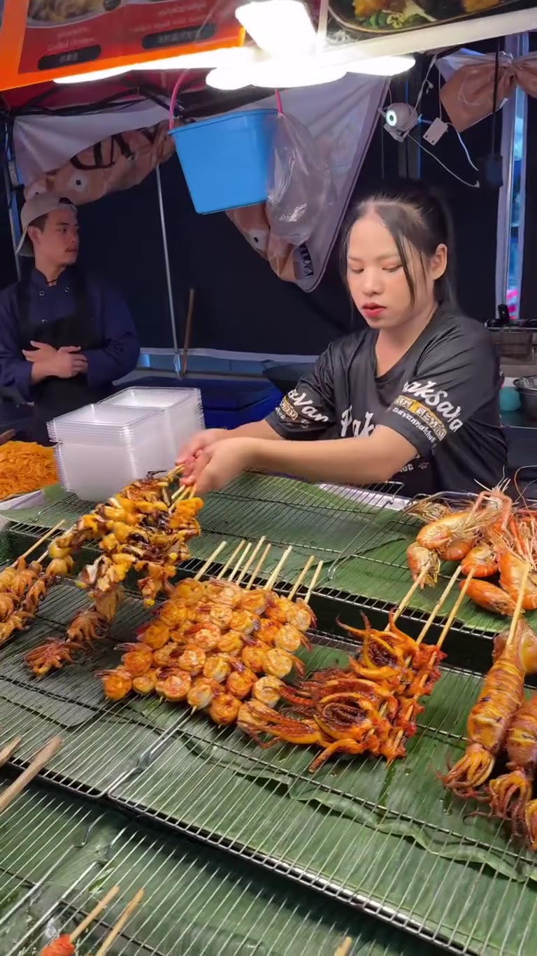 Grilled seafood skewers at PhakSaVan street stall