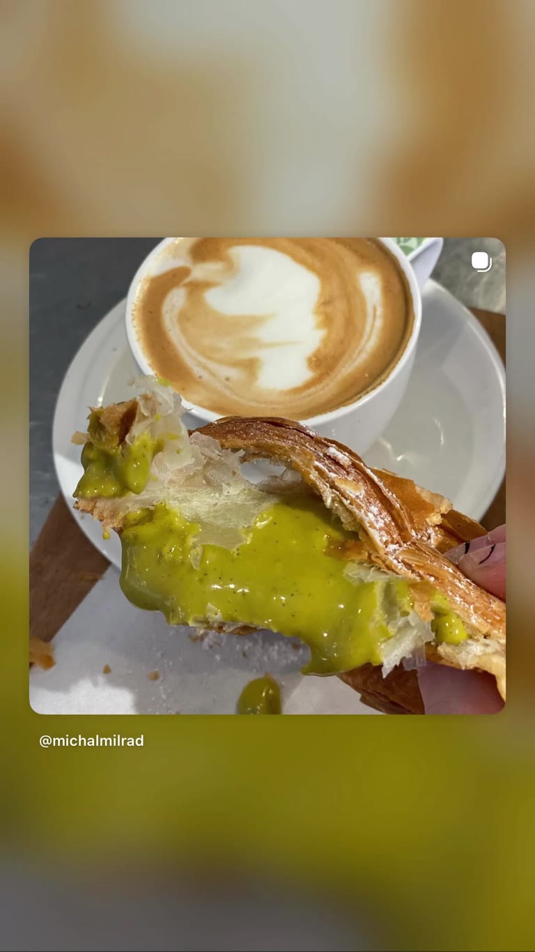 Pistachio cream croissant and cappuccino in Rome