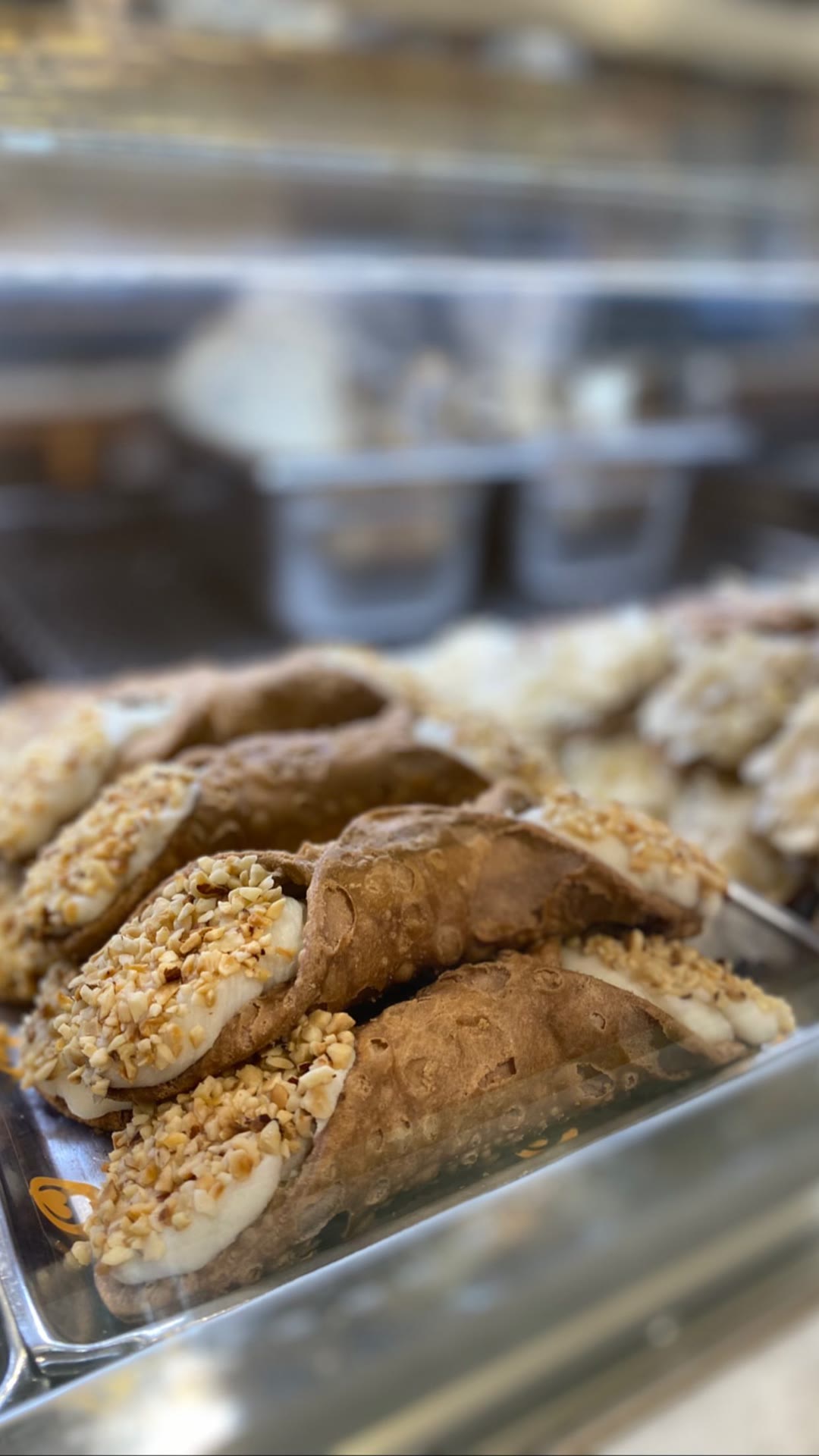 Cannoli in a Naples pastry case