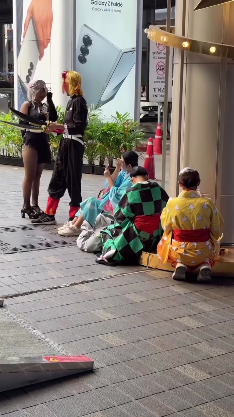 Anime cosplayers outside a Bangkok mall