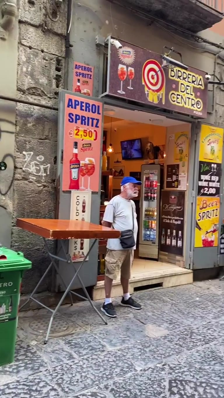 Walking Via dei Tribunali past Birreria del Centro