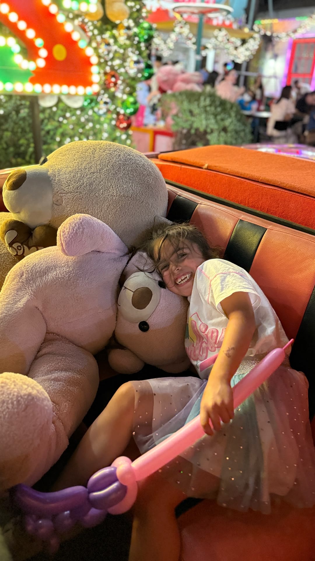 Kid with giant teddy bears at a Bangkok spot