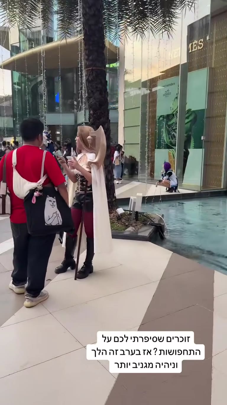 Cosplayers outside a Bangkok luxury mall