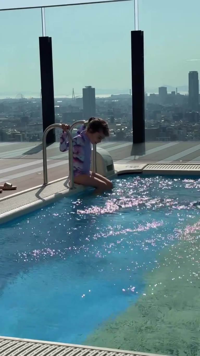 Rooftop pool with Osaka skyline views