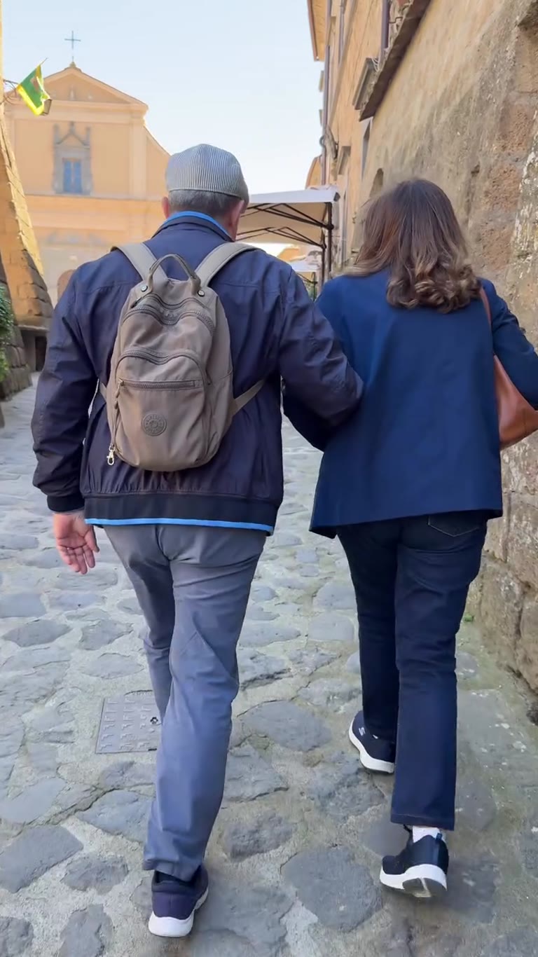 Cobbled alley to the church, a day trip from Rome