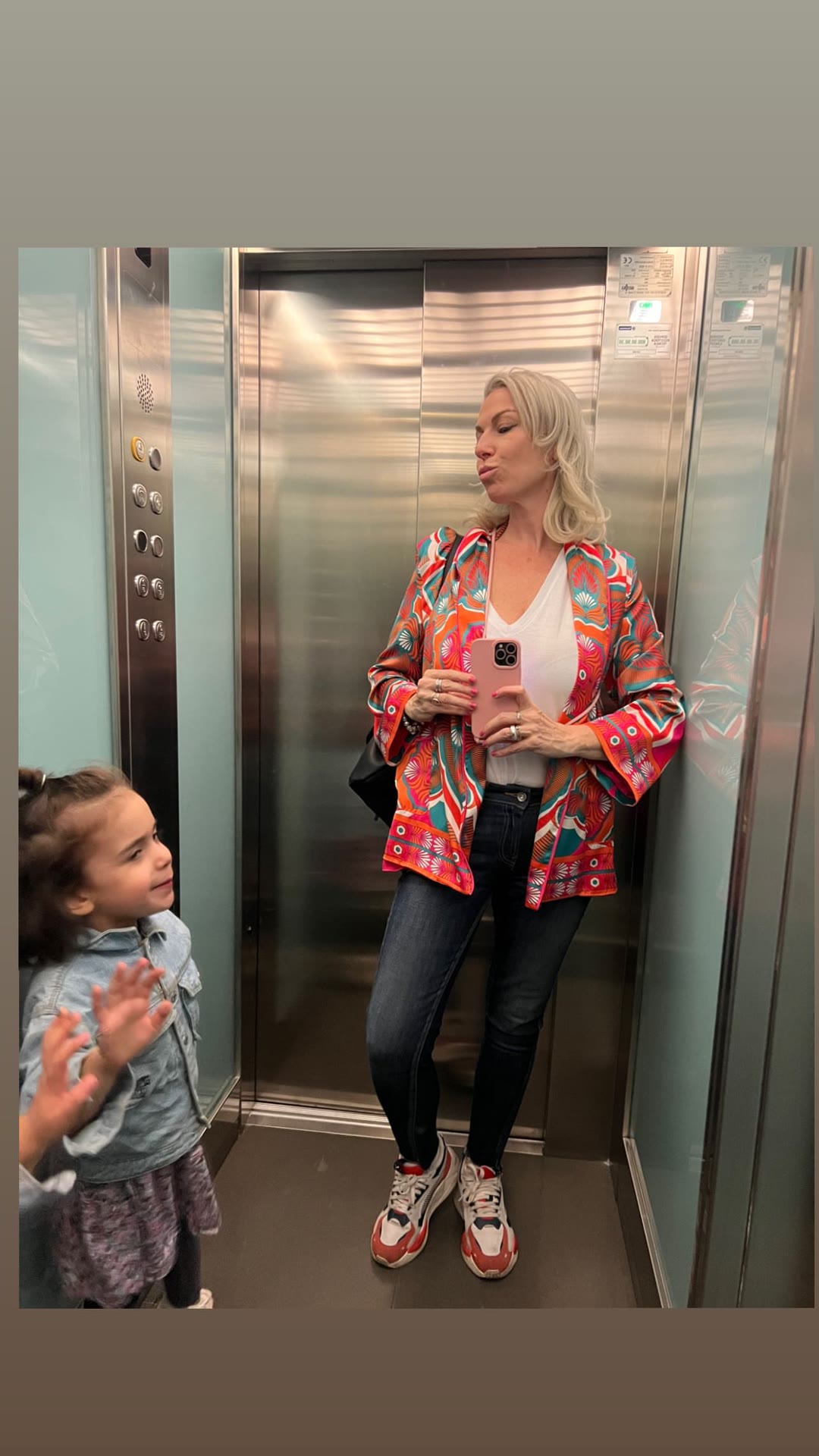 Elevator mirror selfie in a printed kimono