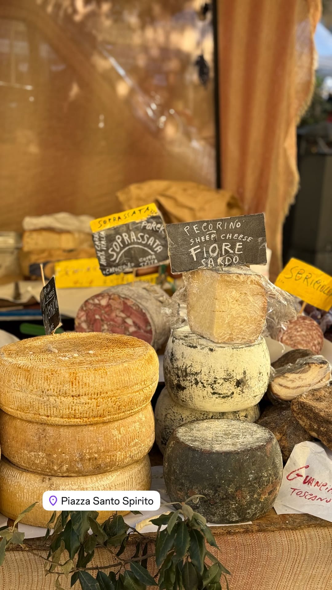 Cheese stall at Piazza Santo Spirito market