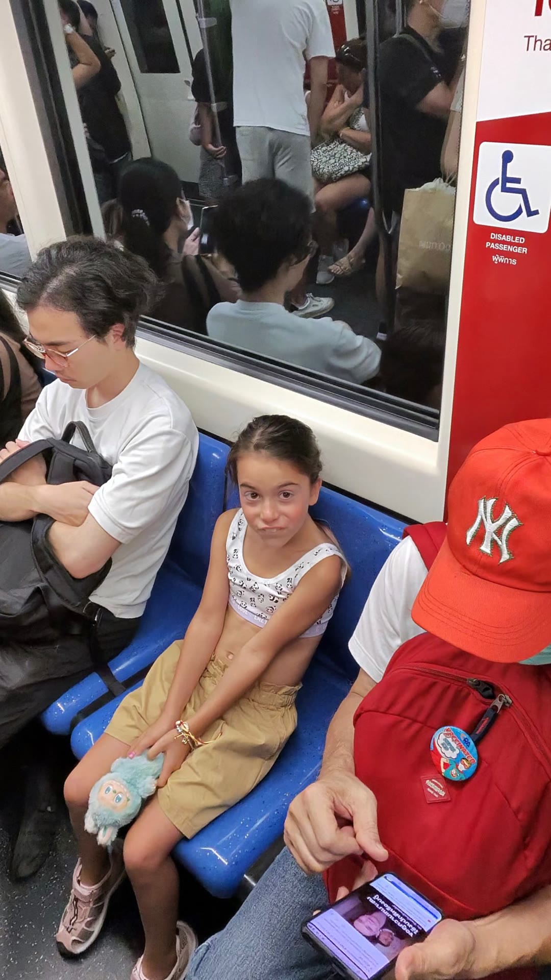 Crowded Bangkok metro ride