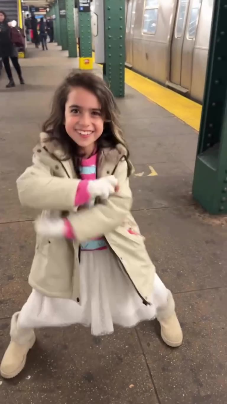 Dancing on the West 4th St subway platform, NYC