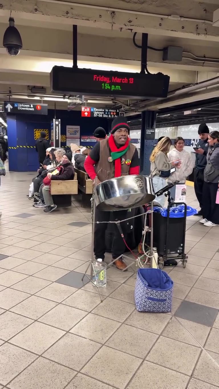 Steel drum busker at 59th St–Columbus Circle