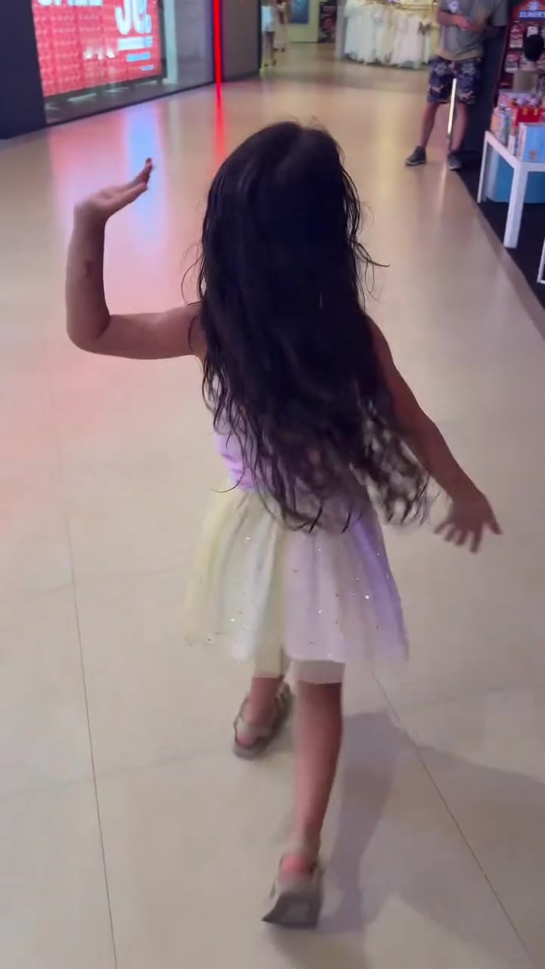 Twirling through a Phuket mall
