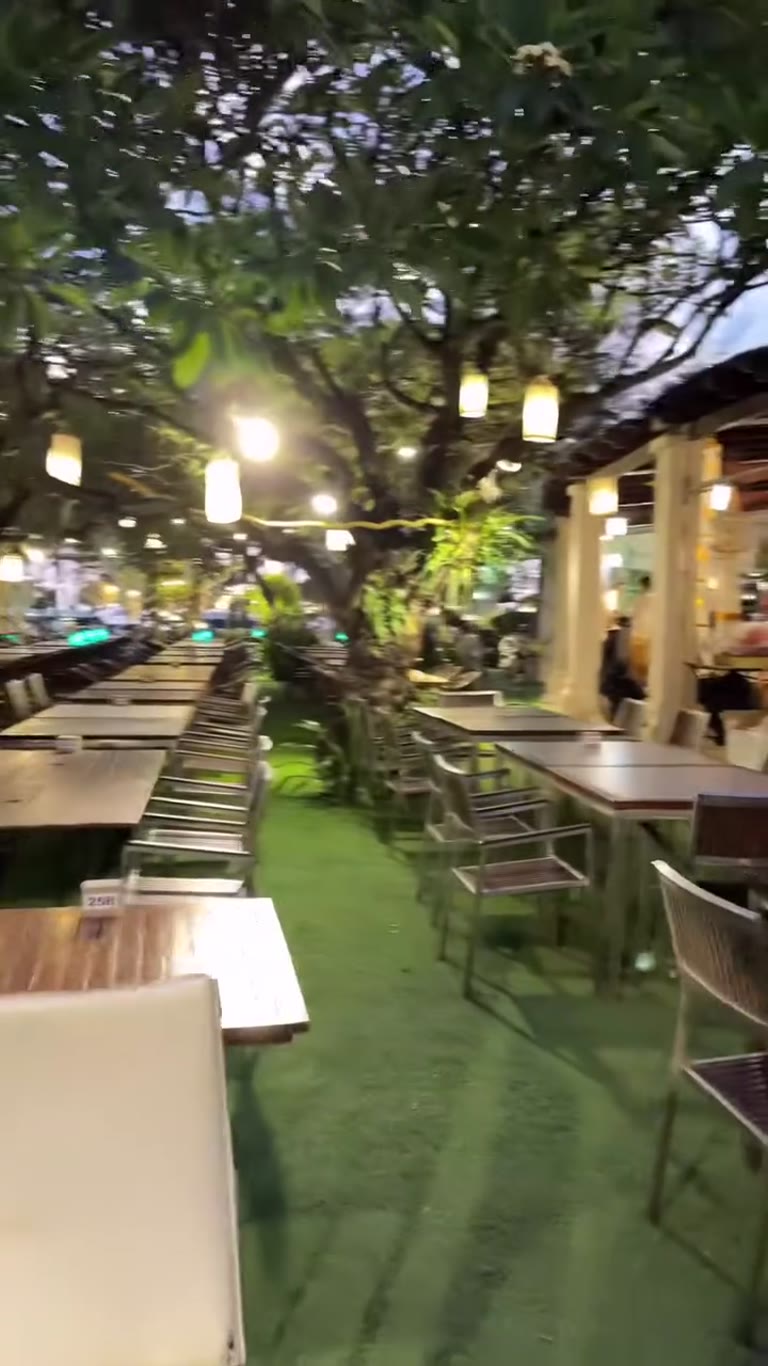 Garden restaurant under lantern-lit trees in Phuket