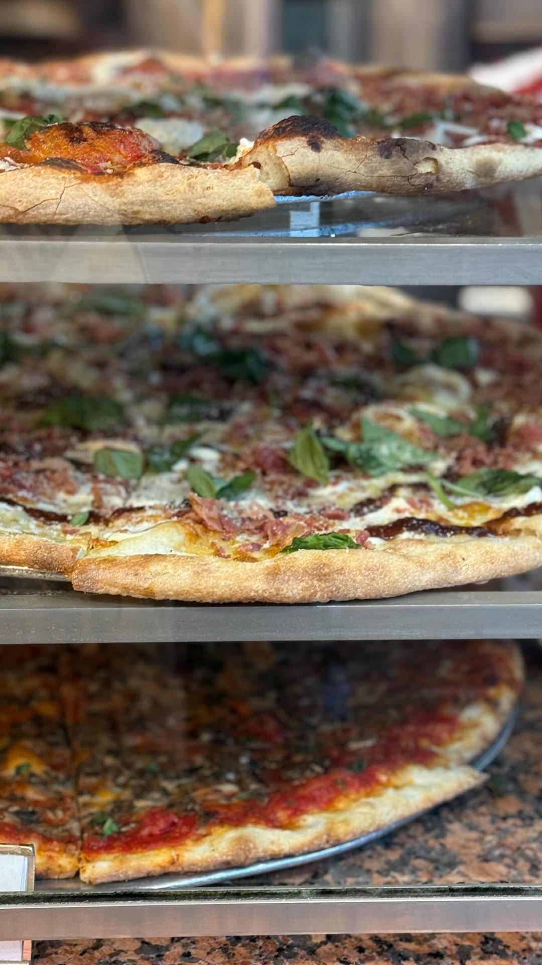 Pizza display at a New York pizzeria