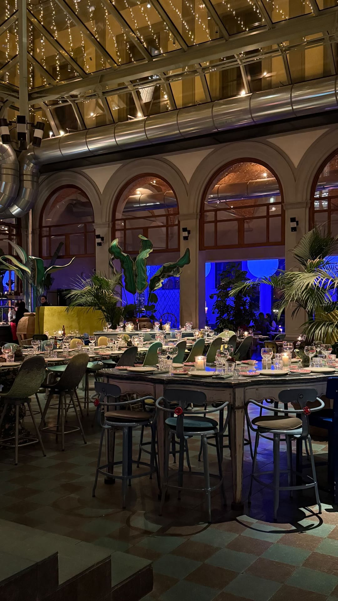 Atmospheric glass-roofed restaurant in Florence