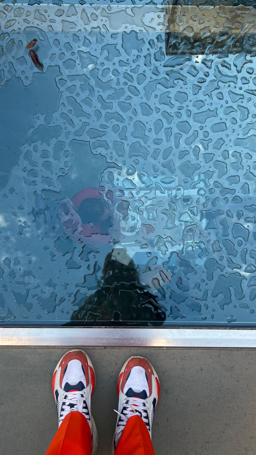 Rain-soaked glass in Venice