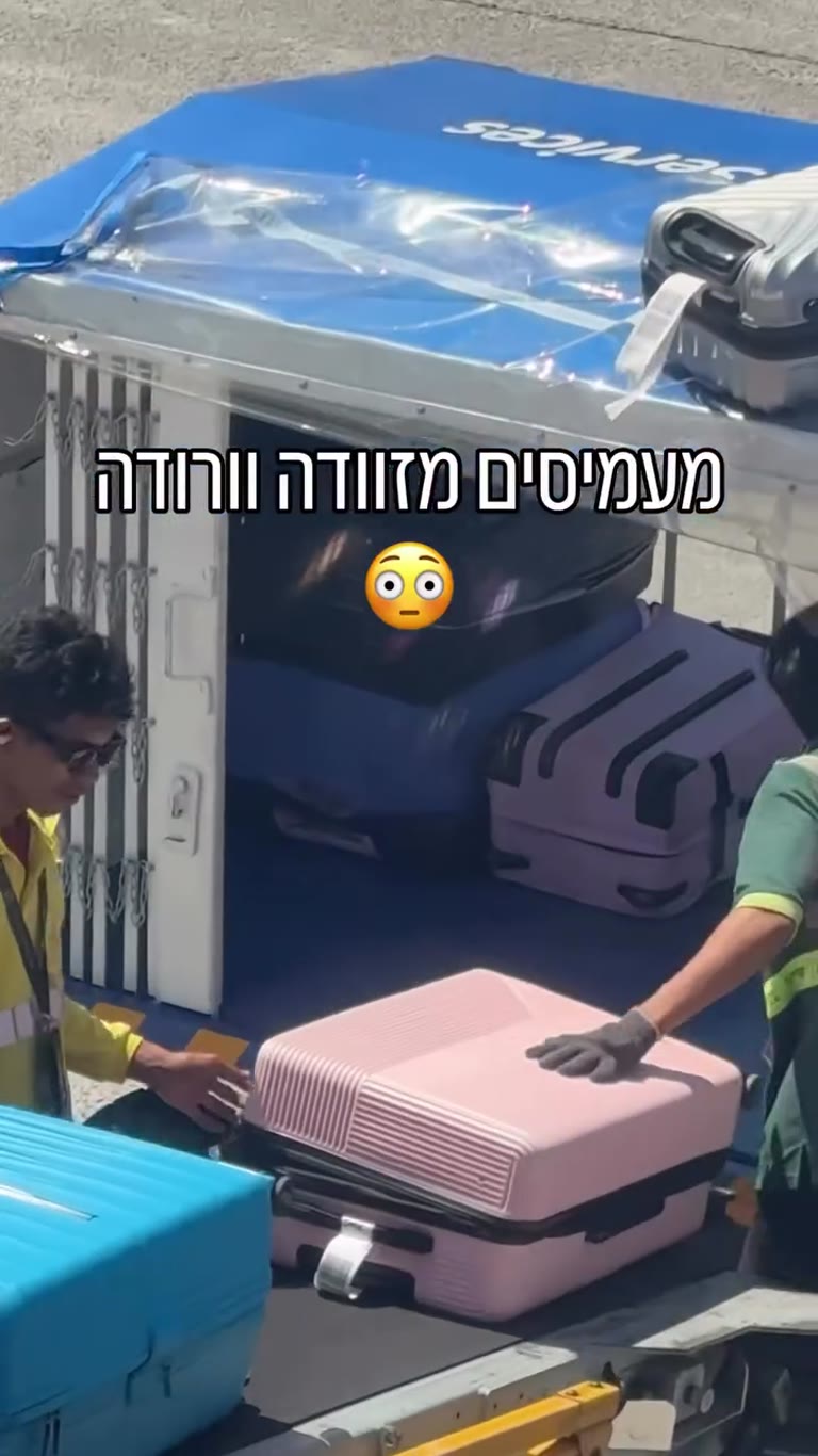 Watching them load her pink suitcase