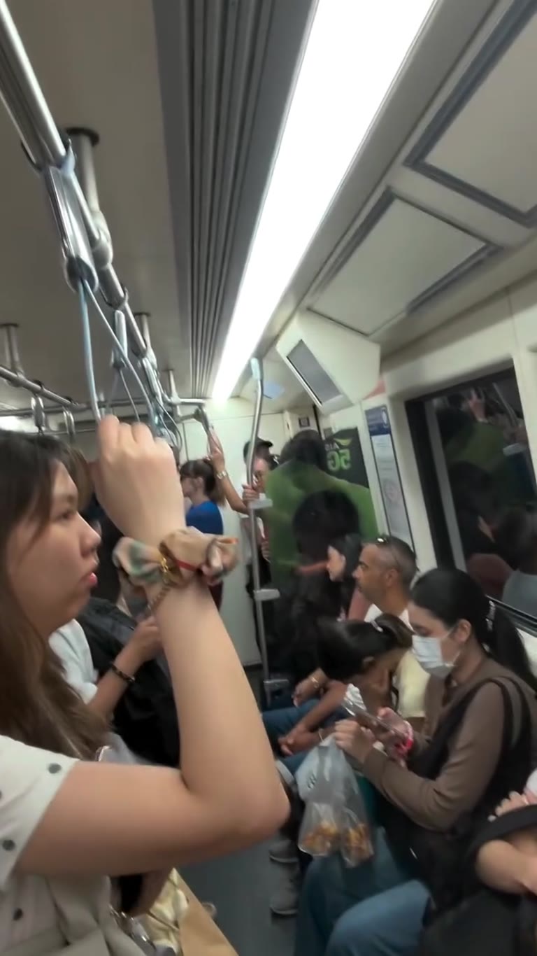 Crowded BTS Skytrain in Bangkok