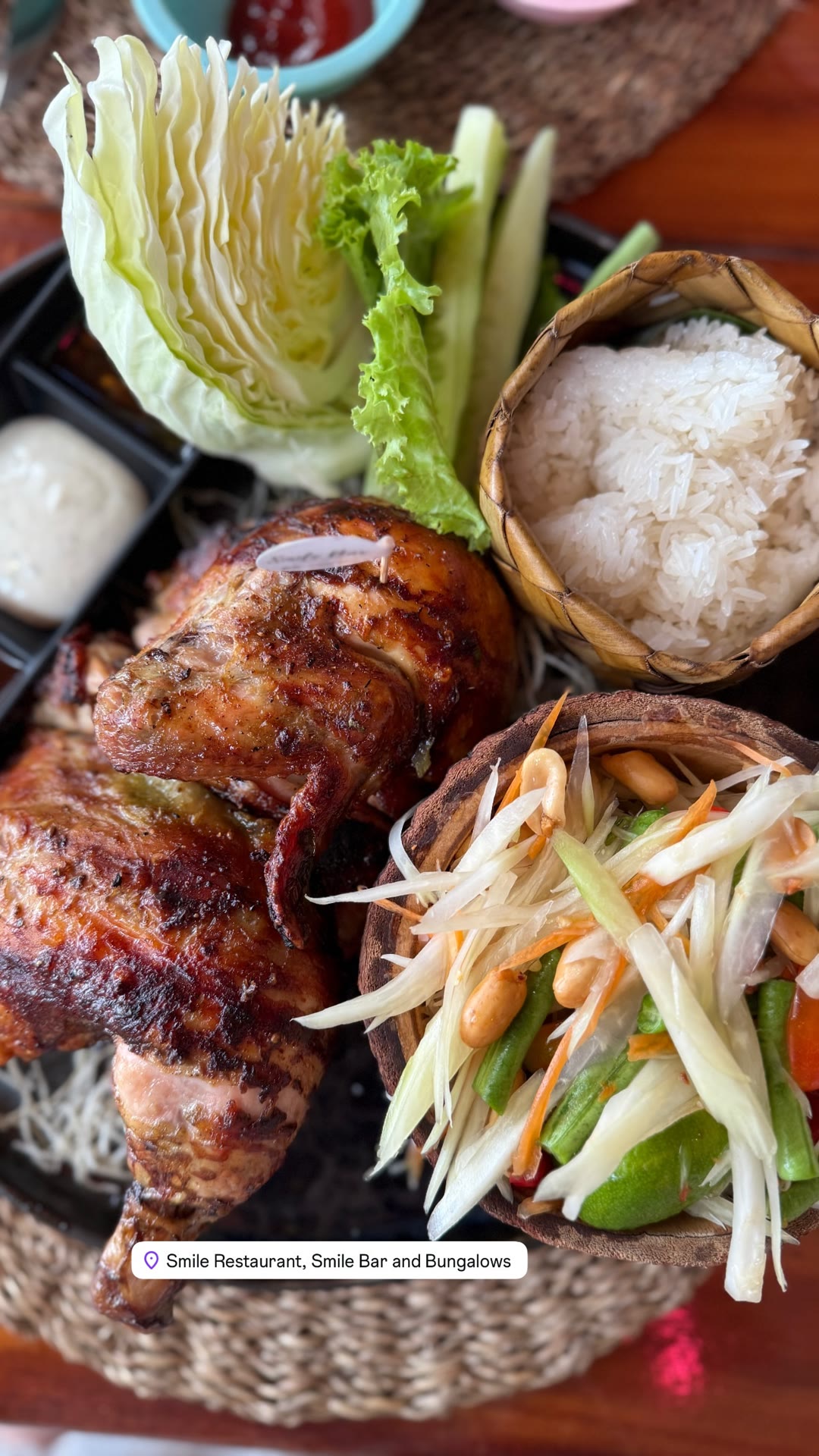 Grilled chicken & som tam at Smile Restaurant, Kamala