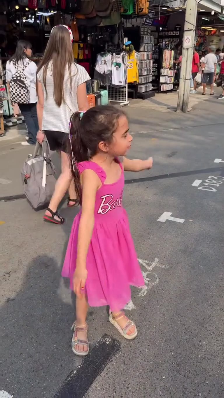 Wandering a Bangkok market in a Barbie dress