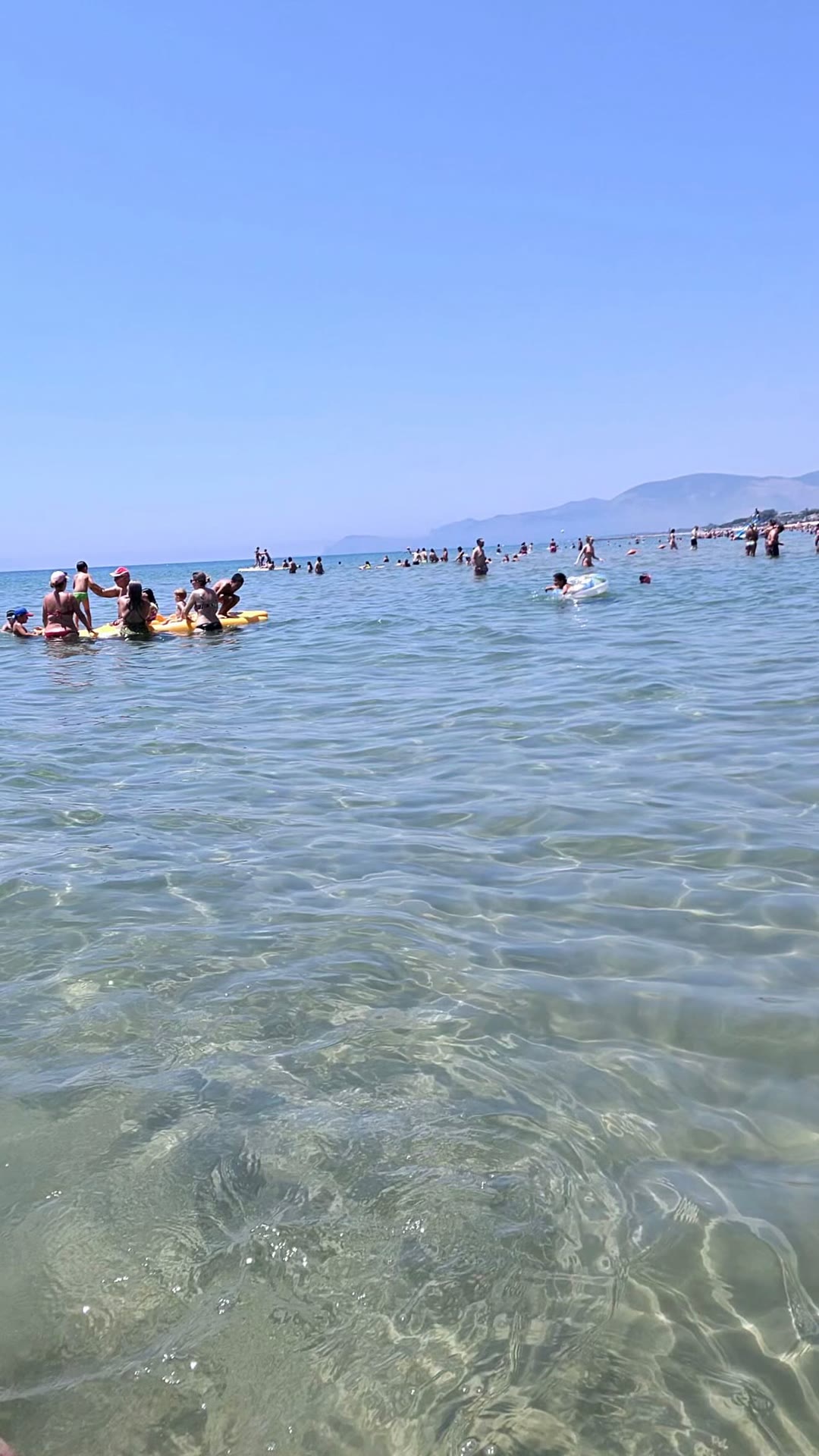 Shallow clear sea on a day trip from Rome