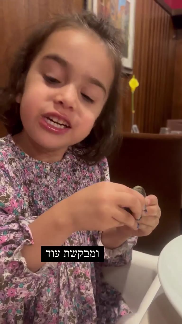 Kid asking for more clams at dinner in Venice