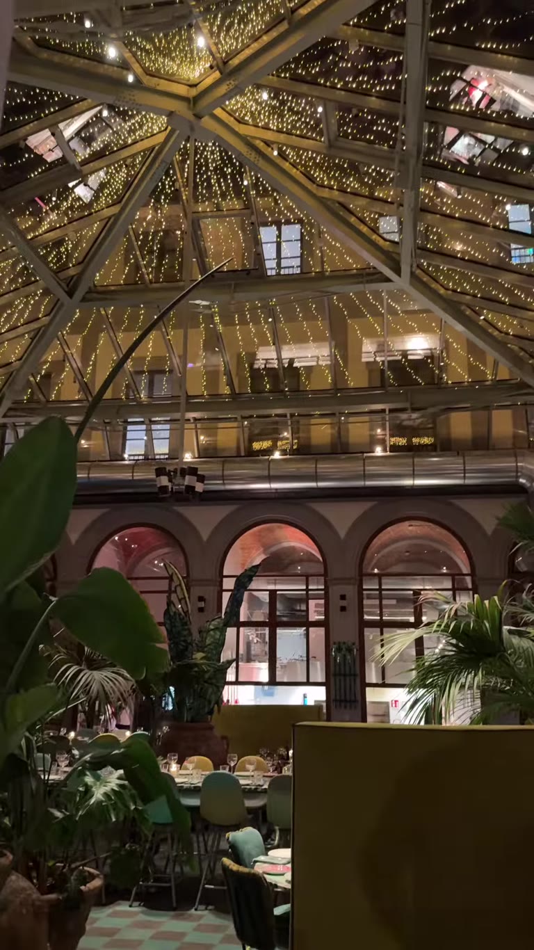 Glass-roofed courtyard restaurant in Florence